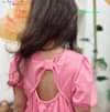 Có thể là hình ảnh về 1 người, đồ ngủ và văn bản